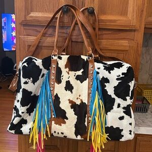 Cow Print Travel Bag with Colorful Fringe Accents